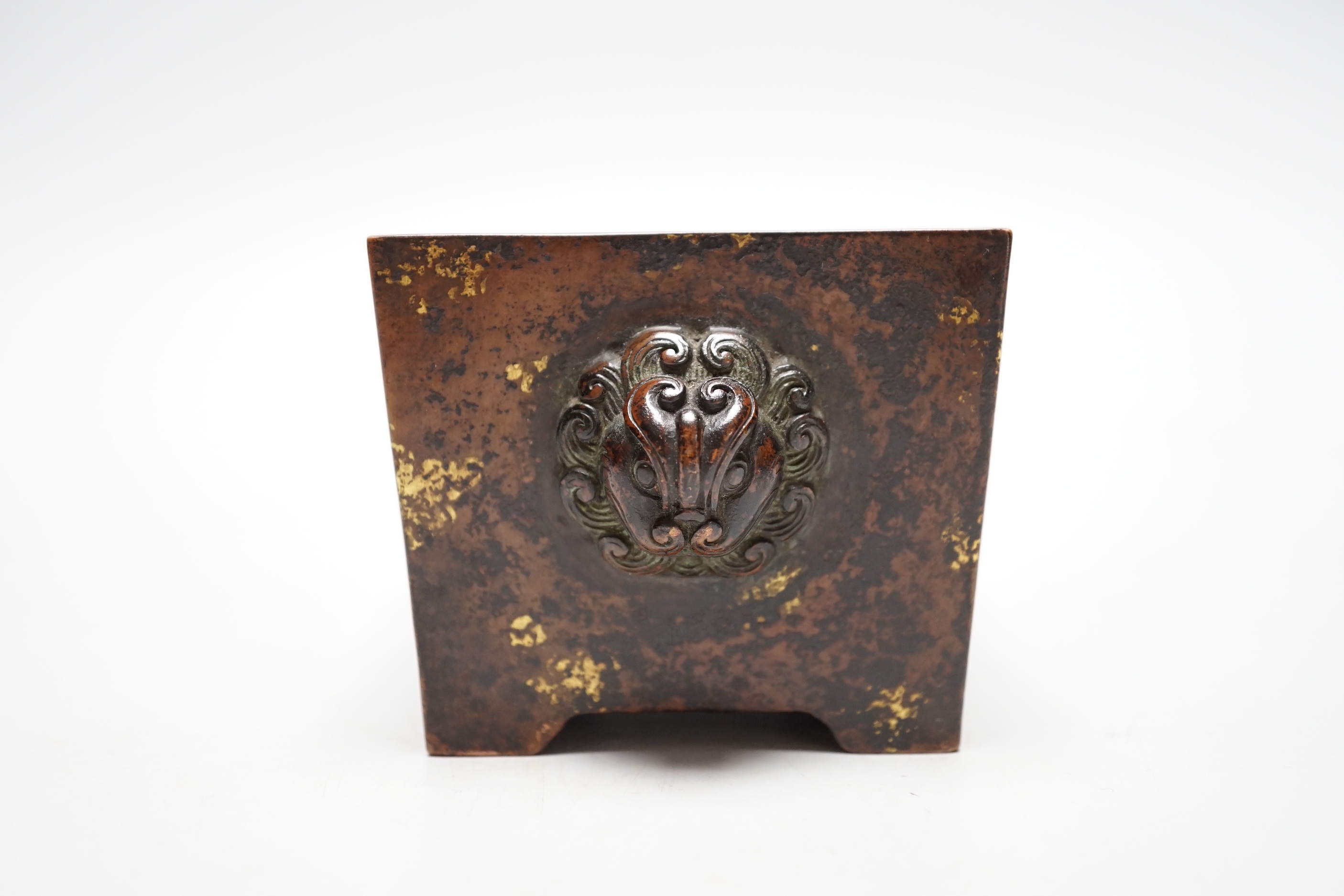 A Chinese gold splash bronze censer, fangding, 7cm tall